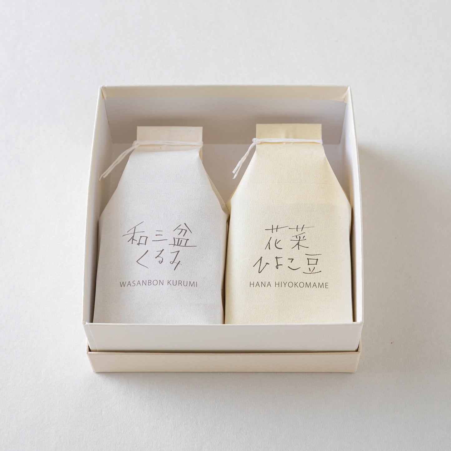 ひよこ豆 1袋 ・ 和三盆くるみ 1袋(化粧箱入)